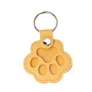 <strong>Guau!</strong> Llavero Guardapelos en Forma de Patita, Color Amarillo