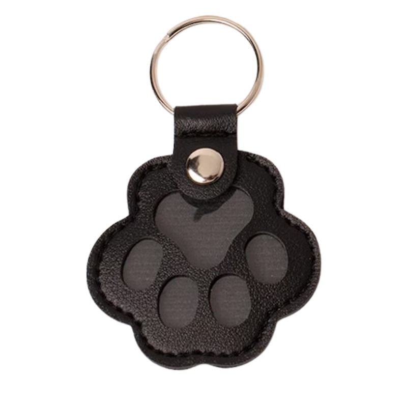 <strong>Guau!</strong> Llavero Guardapelos en Forma de Patita, Color Negro